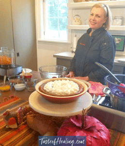 Chef Carol standing with her delicous Chocolate Sweet Potato Chiffon Pie